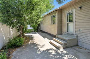 Property entrance featuring a patio