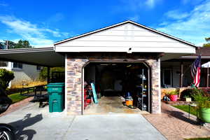 Garage with concrete driveway