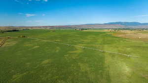 Overview of rural landscape with a mountain backdrop
