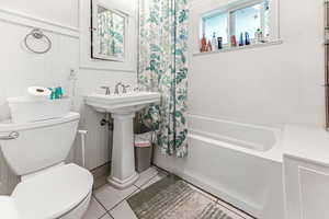 Main level Unit A bathroom with shower tub combo