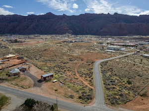 Aerial overview of property's location with mountains and rural landscape