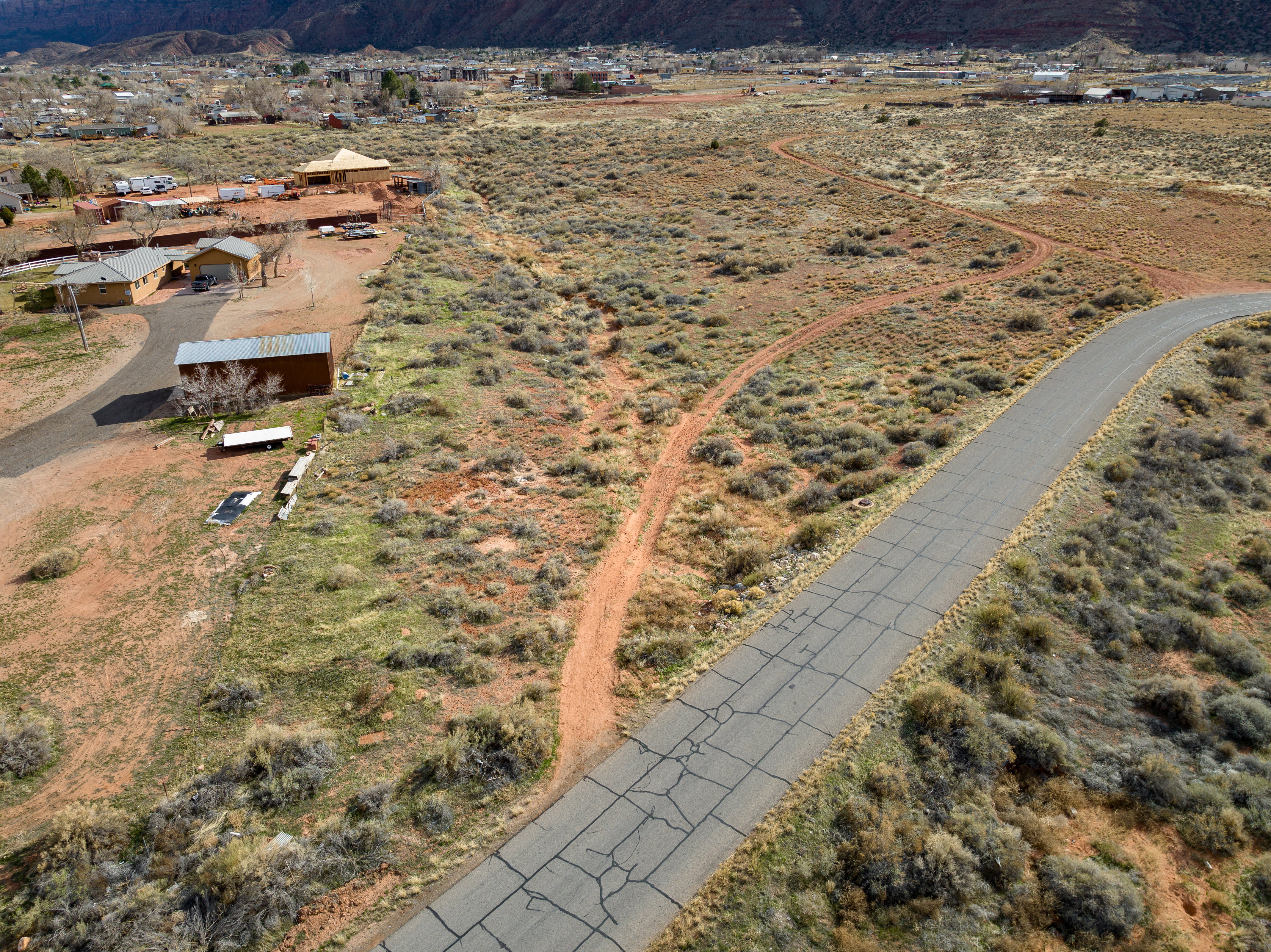Aerial view of property and surrounding area with rural landscape
