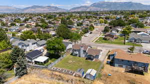Aerial view of residential area featuring mountains