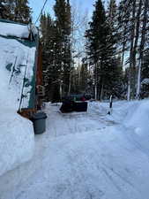 View of yard layered in snow