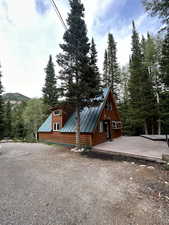 A-frame style home with a metal roof and a standing seam roof