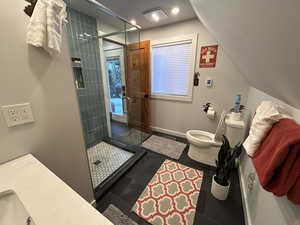 Full bathroom featuring a shower stall, recessed lighting, and vanity