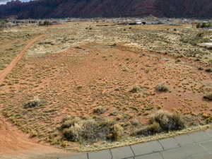 View of mountain backdrop featuring rural landscape and a desert landscape