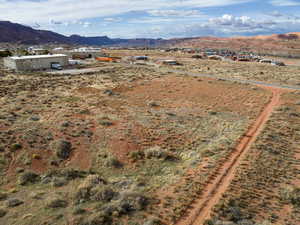 Aerial view of sparsely populated area with mountains