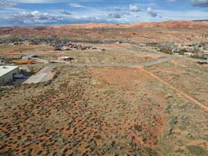 View of rural area with a desert landscape and mountains