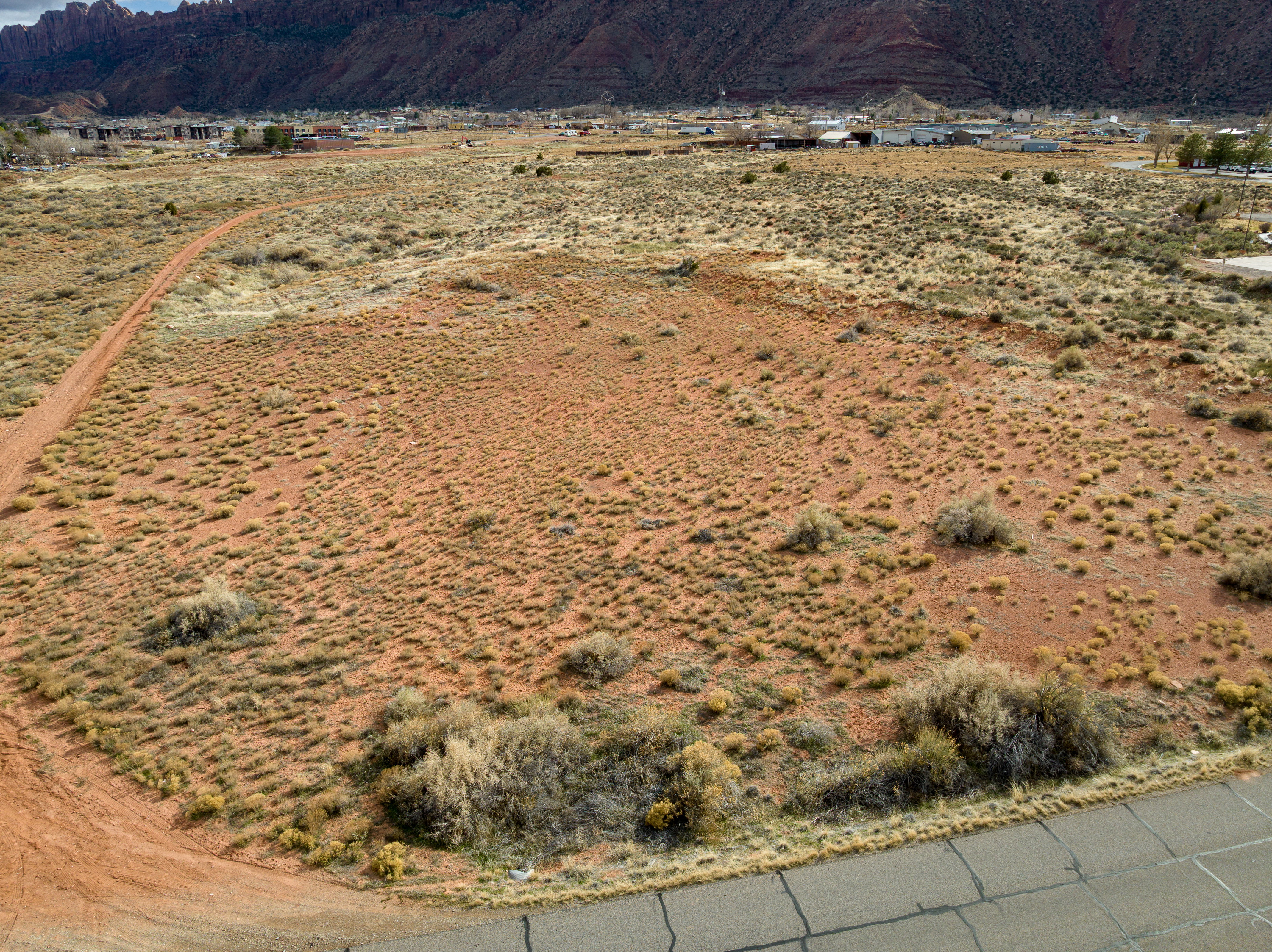 View of mountain backdrop featuring rural landscape and a desert landscape