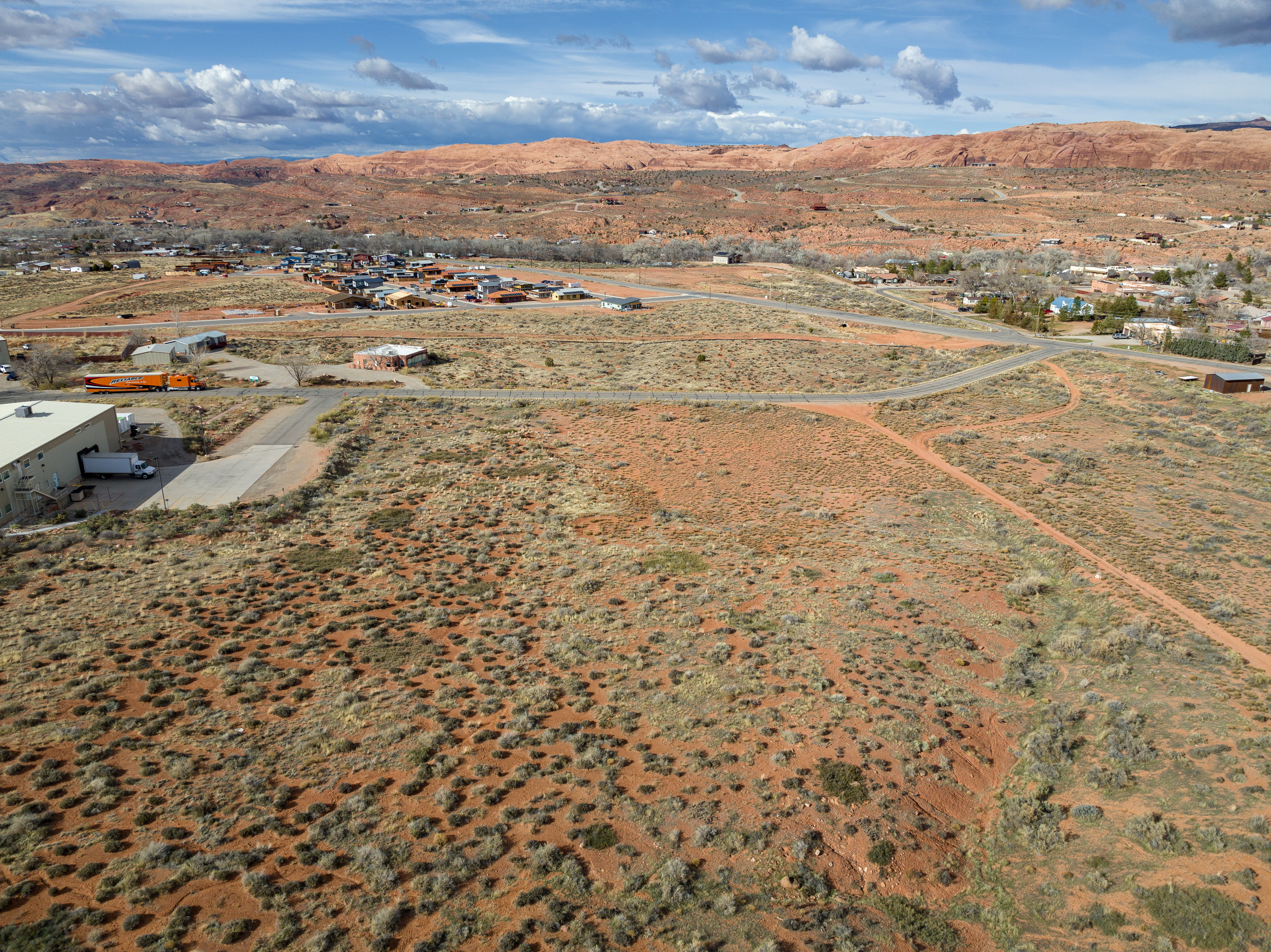 View of rural area with a desert landscape and mountains