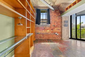 Bedroom with window and balcony access