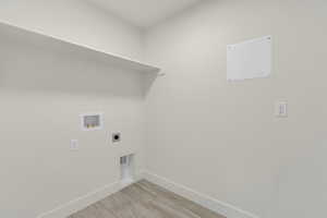 Laundry area featuring washer hookup and hookup for an electric dryer