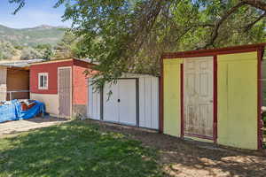 View of shed with a mountain view