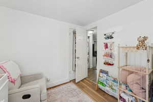 Living area featuring wood finished floors and baseboards