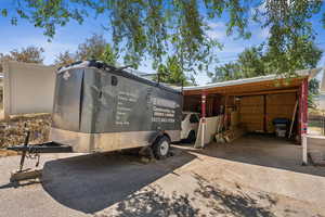 View of home's exterior featuring a carport