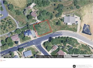 Aerial map of property and surrounding area with property boundaries highlighted