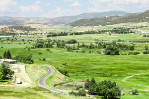 View of mountain background with rural landscape and a pastoral area