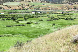 View of mountain backdrop featuring a golf club