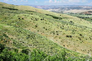 Aerial view of property's location with mountains
