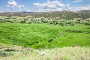 Mountain view with rural landscape and agricultural land