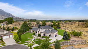 View of subject property featuring a mountain backdrop