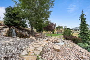 View of yard featuring a trampoline