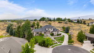 View of subject property featuring a mountain backdrop