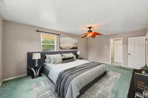 Bedroom featuring carpet flooring and a ceiling fan