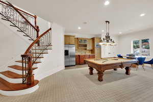 Playroom with recessed lighting, crown molding, light colored carpet, and pool table