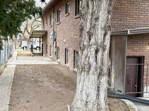 View of side of property with brick siding