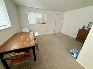 Office area with carpet and baseboards
