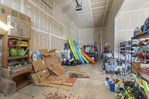 Garage featuring a garage door opener