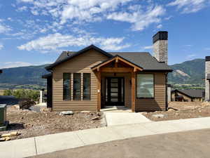 Photo of a similar completed cabin for reference only.