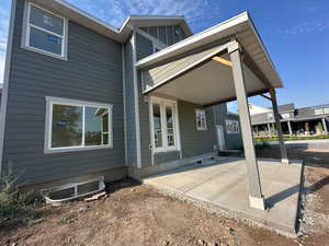 Rear view of house with a patio area
