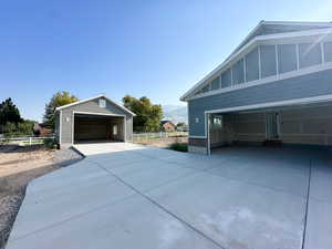 Detached garage with a mountain view