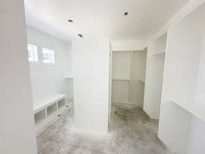 Bathroom with a walk in closet