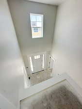 Foyer with a high ceiling