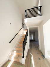 Stairway with a towering ceiling
