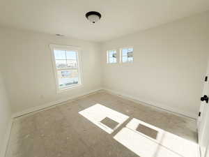 Empty room with baseboards