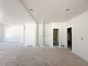 Unfurnished room with a textured ceiling