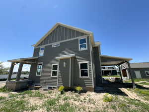 Side view of property with board and batten siding