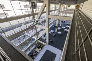 Stairs featuring a high ceiling