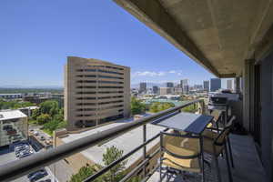Balcony featuring a view of city and grilling area