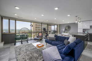 Living room with a wall of windows
