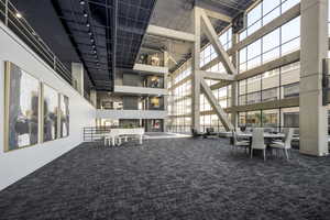 Lobby featuring a towering ceiling