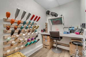 Office featuring wood finished floors