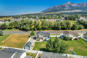 Aerial view of residential area featuring mountains