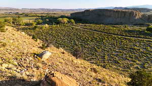 View of mountain background featuring rural landscape
