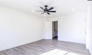 Spare room with light wood-style flooring, recessed lighting, and ceiling fan